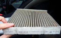 How do I change the cabin filter for my Toyota Camry?