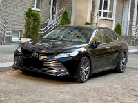 New Toyota Camry versus three-year-old BMW 5 Series, which to buy